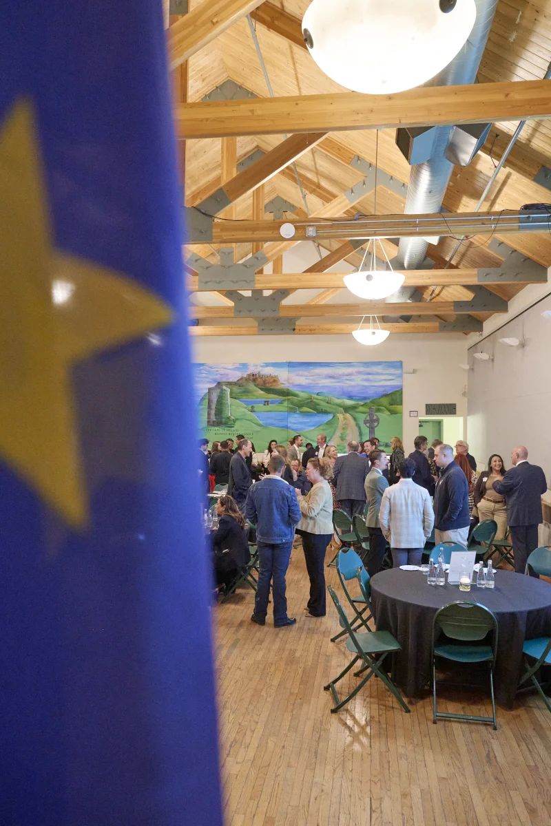 Arizona-European Young Entrepreneur Award ceremony networking reception at Irish Cultural Center Phoenix with EU flag and business leaders
