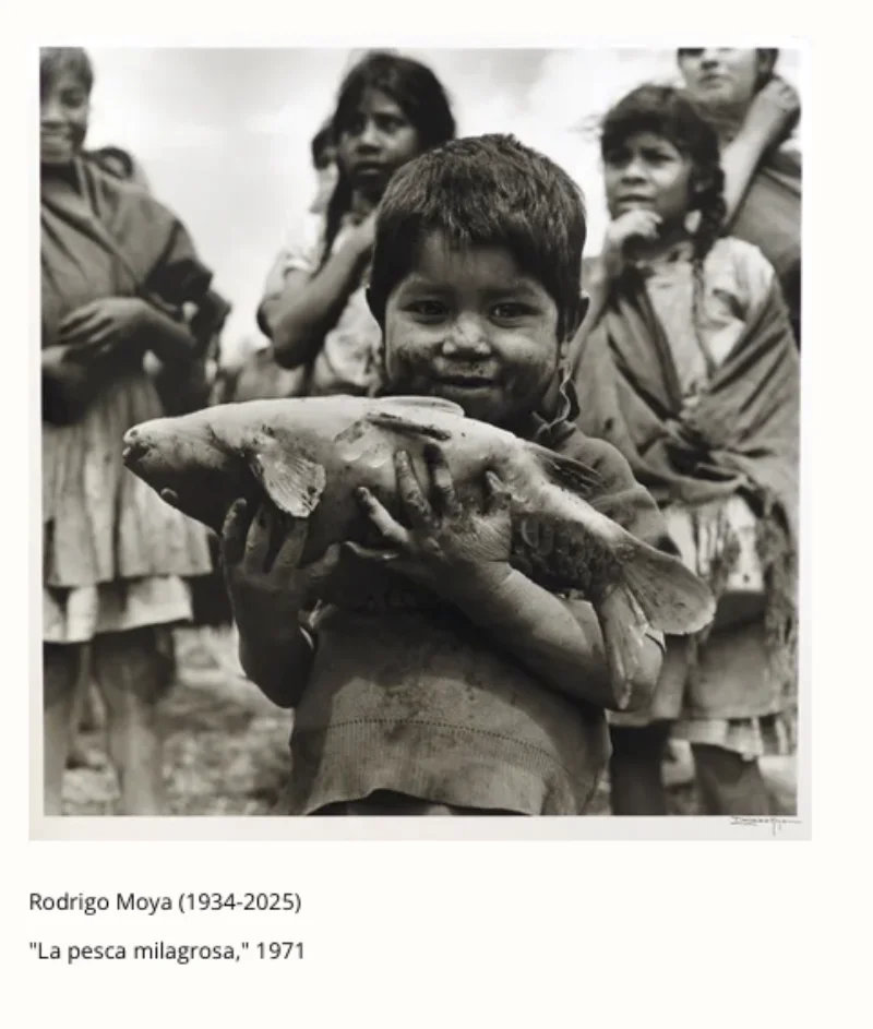 A small boy beaming with joy holding a large fish, other children watching behind him, 1971 — gelatin silver print by Rodrigo Moya