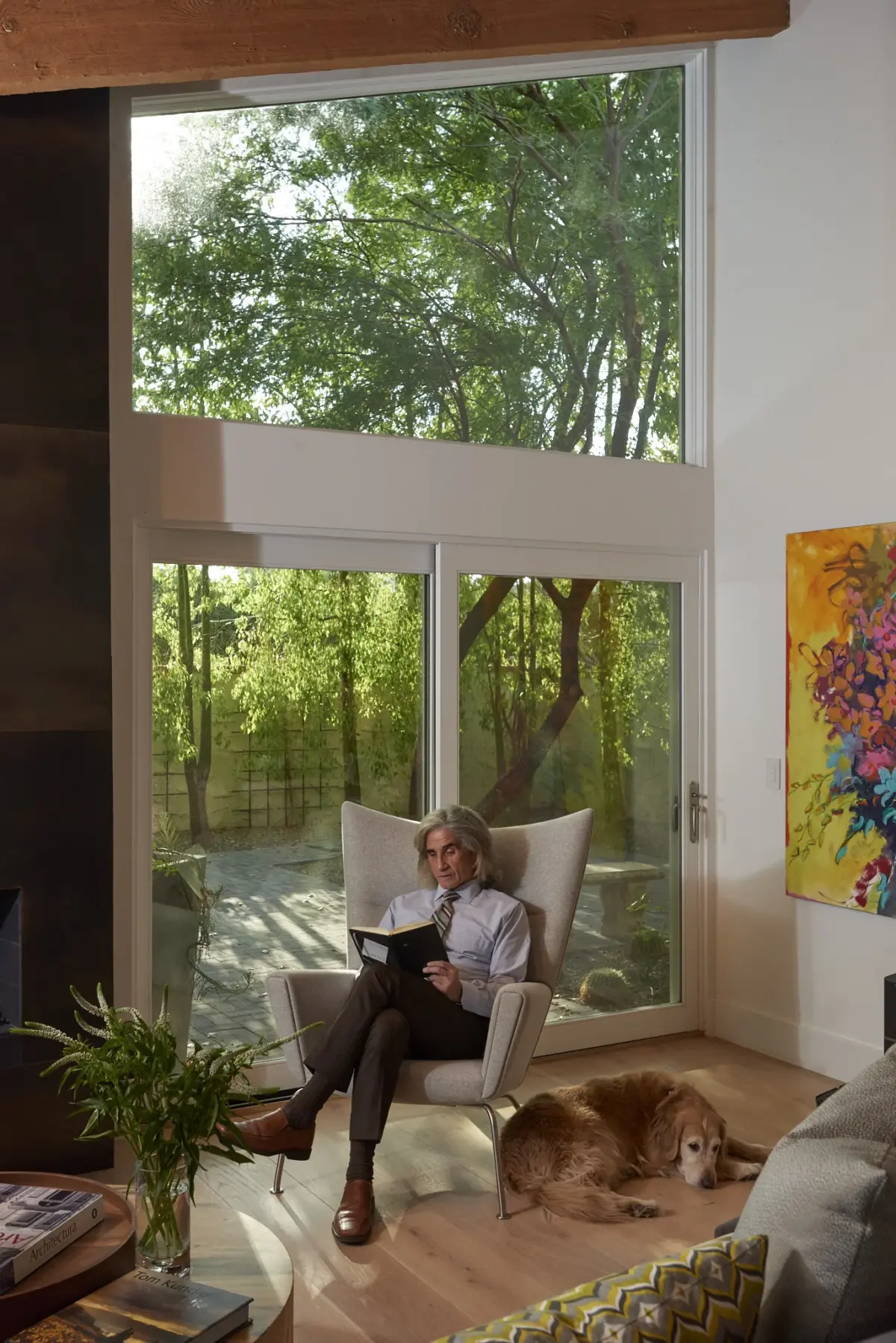 Financial advisor personal branding photography session at home office with golden retriever Phoenix Arizona