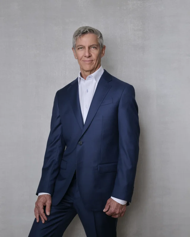 Man's corporate headshot with direct eye contact, professional studio portrait near Scottsdale