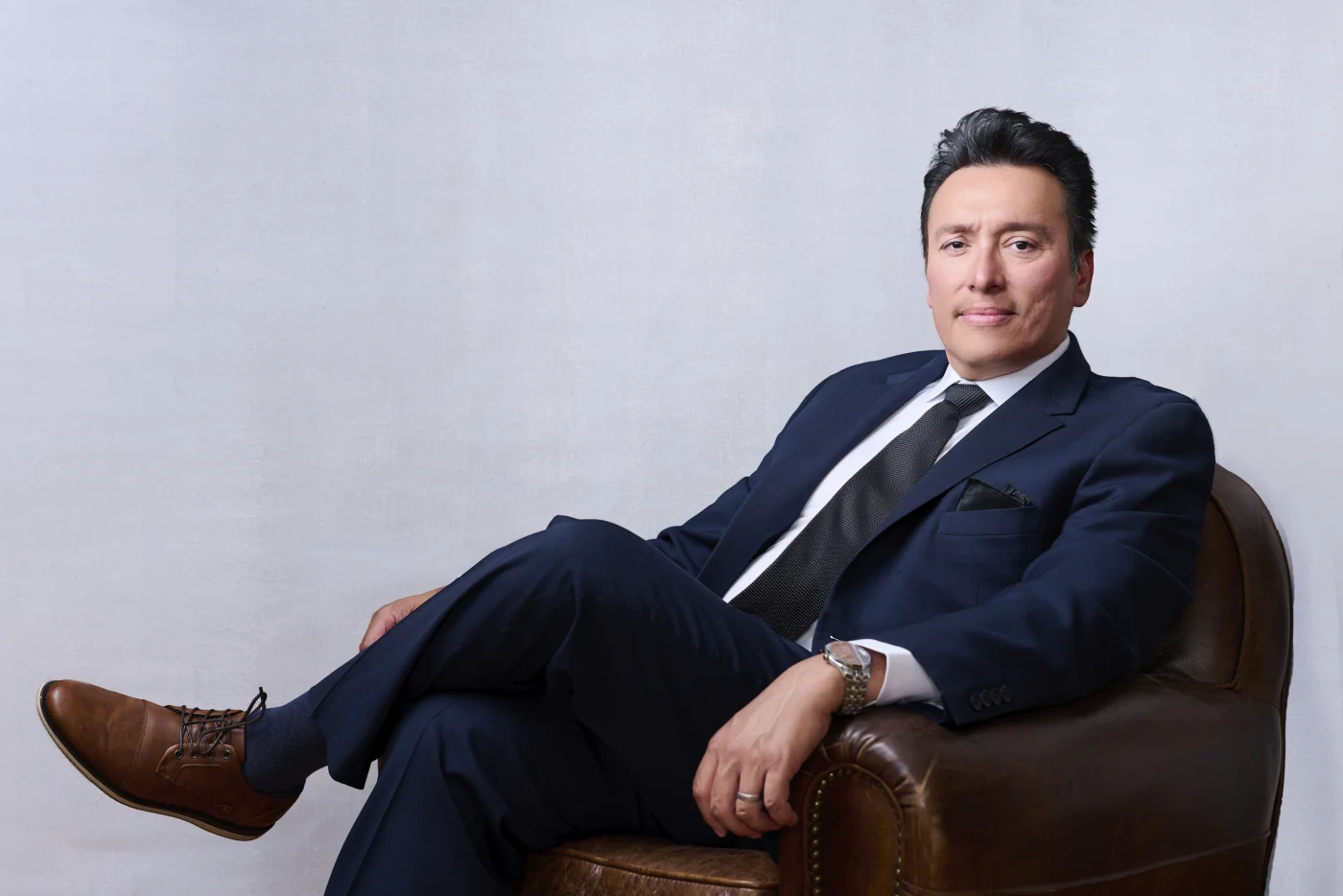 Cinematic wide-angle executive portrait, professional headshot photographer serving Scottsdale